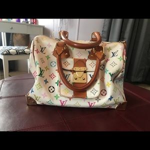Authentic Speedy 35 Louie Vuitton.